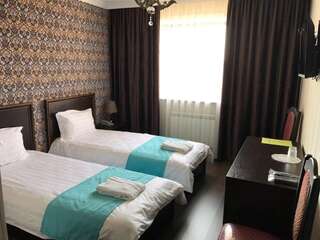 Отель Hotel Bukpa Караганда Двухместный номер с 2 отдельными кроватями-4